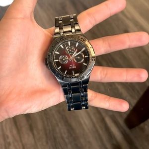 This is a relic watch it is gray and black